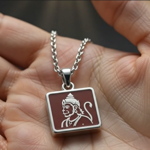 Close-up of Shriva 925 Silver Bajrangbali Pendant Necklace on a man's neck, showing detailed Hanuman engraving.